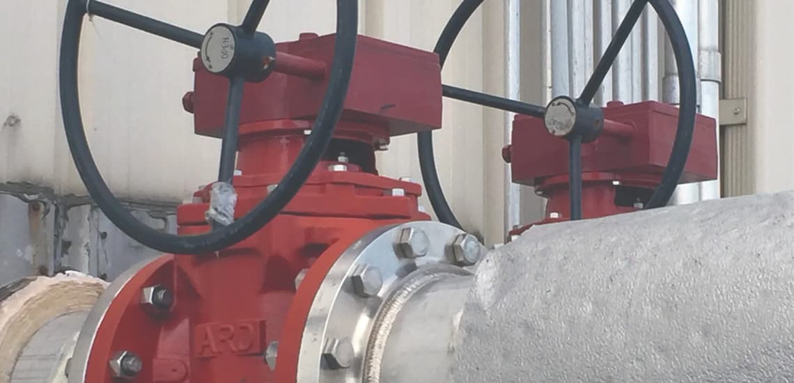 A close up of a pipe that controls Water Treatment